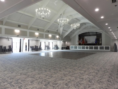 On the 6th hole at Southport, this turn-key ''Vineyard'' on The Golf Club At Southport in Massachusetts - for sale on GolfHomes.com, golf home, golf lot