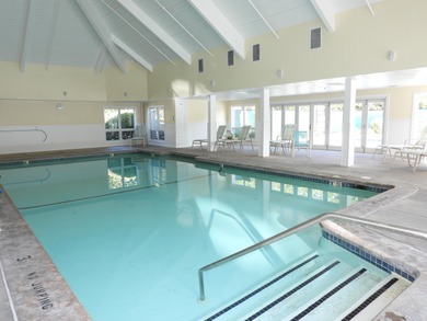 On the 6th hole at Southport, this turn-key ''Vineyard'' on The Golf Club At Southport in Massachusetts - for sale on GolfHomes.com, golf home, golf lot