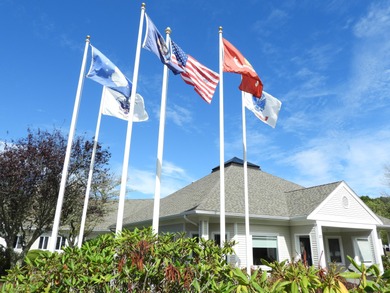 On the 6th hole at Southport, this turn-key ''Vineyard'' on The Golf Club At Southport in Massachusetts - for sale on GolfHomes.com, golf home, golf lot