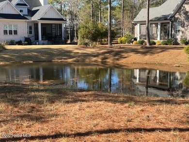 Located on a small pond!! Close to the new Ridge Center and on Ocean Ridge Plantation in North Carolina - for sale on GolfHomes.com, golf home, golf lot