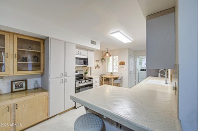 What a bright, cheery deceptively large home in beautiful Sun on Sun City Country Club in Arizona - for sale on GolfHomes.com, golf home, golf lot