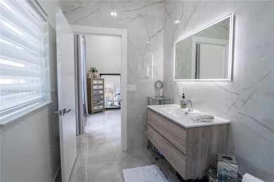 Completely renovated single family home in the Banyans of Broken on Broken Sound Golf and Club  in Florida - for sale on GolfHomes.com, golf home, golf lot