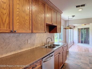 Looking for an UPDATED, move-in ready condo? Look no further on Heather Golf and Country Club in Florida - for sale on GolfHomes.com, golf home, golf lot