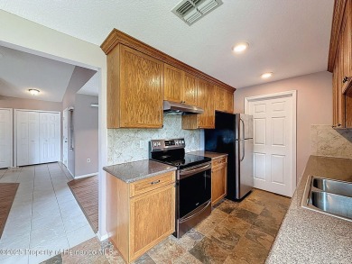 Looking for an UPDATED, move-in ready condo? Look no further on Heather Golf and Country Club in Florida - for sale on GolfHomes.com, golf home, golf lot