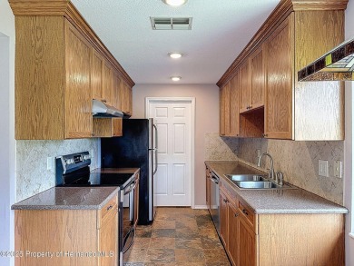 Looking for an UPDATED, move-in ready condo? Look no further on Heather Golf and Country Club in Florida - for sale on GolfHomes.com, golf home, golf lot