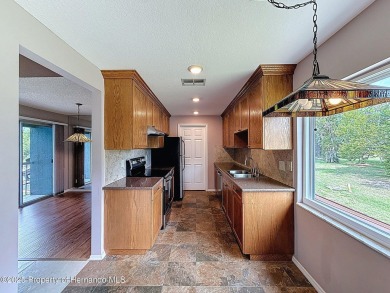 Looking for an UPDATED, move-in ready condo? Look no further on Heather Golf and Country Club in Florida - for sale on GolfHomes.com, golf home, golf lot