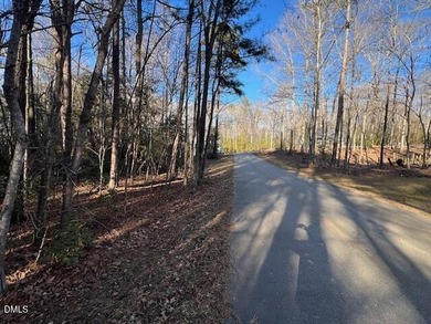 Build your dream home in this beautiful gated lake community! on River Golf and Country Club at Lake Royale in North Carolina - for sale on GolfHomes.com, golf home, golf lot