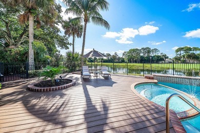 Extraordinary panoramic lake, sunset, and golf views from this on PGA National Golf Club in Florida - for sale on GolfHomes.com, golf home, golf lot