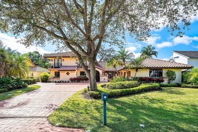 Extraordinary panoramic lake, sunset, and golf views from this on PGA National Golf Club in Florida - for sale on GolfHomes.com, golf home, golf lot