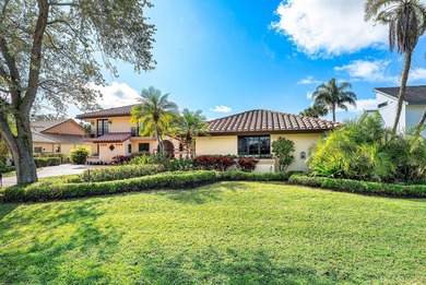 Extraordinary panoramic lake, sunset, and golf views from this on PGA National Golf Club in Florida - for sale on GolfHomes.com, golf home, golf lot