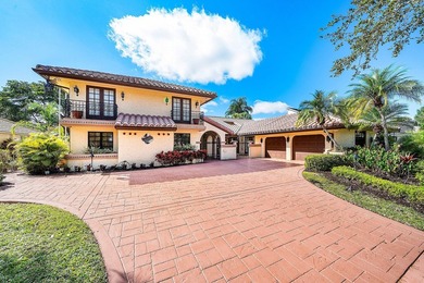 Extraordinary panoramic lake, sunset, and golf views from this on PGA National Golf Club in Florida - for sale on GolfHomes.com, golf home, golf lot