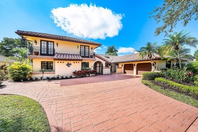 Extraordinary panoramic lake, sunset, and golf views from this on PGA National Golf Club in Florida - for sale on GolfHomes.com, golf home, golf lot