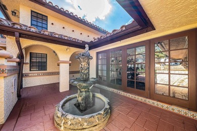 Extraordinary panoramic lake, sunset, and golf views from this on PGA National Golf Club in Florida - for sale on GolfHomes.com, golf home, golf lot