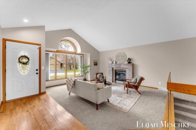 Welcome to 7024 Camelback Dr NE - a beautiful ranch in Rockford on Silver Lake Country Club in Michigan - for sale on GolfHomes.com, golf home, golf lot
