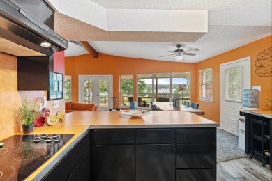 VIBRANT INKS LAKE COTTAGE -- Set on 1.2+ acres across two on Highland Lakes Golf Club in Texas - for sale on GolfHomes.com, golf home, golf lot