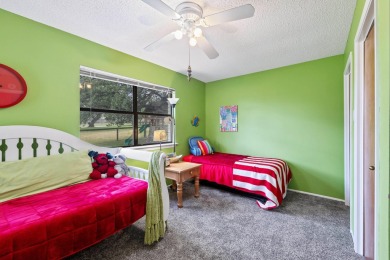 VIBRANT INKS LAKE COTTAGE -- Set on 1.2+ acres across two on Highland Lakes Golf Club in Texas - for sale on GolfHomes.com, golf home, golf lot