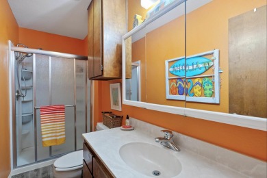 VIBRANT INKS LAKE COTTAGE -- Set on 1.2+ acres across two on Highland Lakes Golf Club in Texas - for sale on GolfHomes.com, golf home, golf lot
