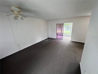 What a view! Come see this 1 bed, 1.5 bath home located on lake on Summertree Golf Course in Florida - for sale on GolfHomes.com, golf home, golf lot