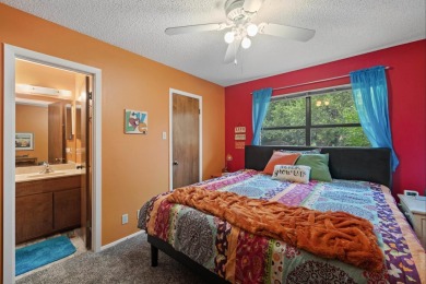 VIBRANT INKS LAKE COTTAGE -- Set on 1.2+ acres across two on Highland Lakes Golf Club in Texas - for sale on GolfHomes.com, golf home, golf lot