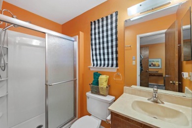 VIBRANT INKS LAKE COTTAGE -- Set on 1.2+ acres across two on Highland Lakes Golf Club in Texas - for sale on GolfHomes.com, golf home, golf lot