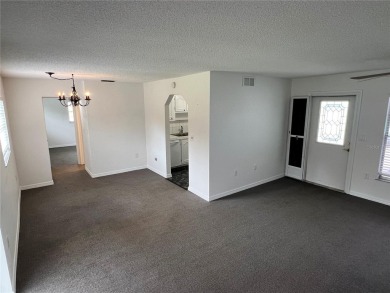 What a view! Come see this 1 bed, 1.5 bath home located on lake on Summertree Golf Course in Florida - for sale on GolfHomes.com, golf home, golf lot