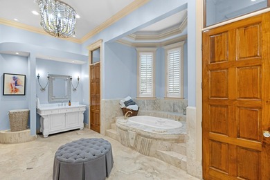 Luxurious Lakefront Living on Burnt Pine's Hole 6. This 4BR/4BA on Sandestin Golf and Beach Resort - Raven in Florida - for sale on GolfHomes.com, golf home, golf lot