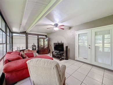 Nestled alongside the tranquil 14th hole of the golf course on Beacon Woods Golf Club in Florida - for sale on GolfHomes.com, golf home, golf lot