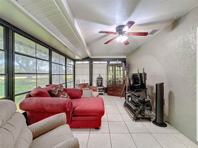 Nestled alongside the tranquil 14th hole of the golf course on Beacon Woods Golf Club in Florida - for sale on GolfHomes.com, golf home, golf lot