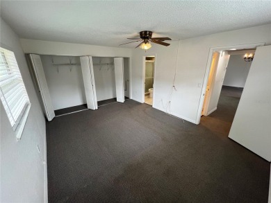 What a view! Come see this 1 bed, 1.5 bath home located on lake on Summertree Golf Course in Florida - for sale on GolfHomes.com, golf home, golf lot