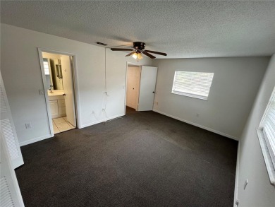 What a view! Come see this 1 bed, 1.5 bath home located on lake on Summertree Golf Course in Florida - for sale on GolfHomes.com, golf home, golf lot