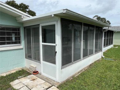 What a view! Come see this 1 bed, 1.5 bath home located on lake on Summertree Golf Course in Florida - for sale on GolfHomes.com, golf home, golf lot
