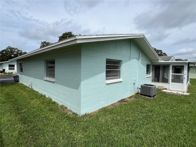 What a view! Come see this 1 bed, 1.5 bath home located on lake on Summertree Golf Course in Florida - for sale on GolfHomes.com, golf home, golf lot