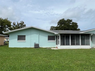What a view! Come see this 1 bed, 1.5 bath home located on lake on Summertree Golf Course in Florida - for sale on GolfHomes.com, golf home, golf lot