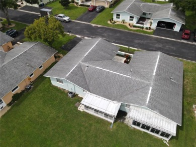 What a view! Come see this 1 bed, 1.5 bath home located on lake on Summertree Golf Course in Florida - for sale on GolfHomes.com, golf home, golf lot