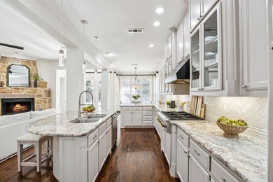 This stunning former Highland Homes model is perfectly on The Tribute At the Colony in Texas - for sale on GolfHomes.com, golf home, golf lot