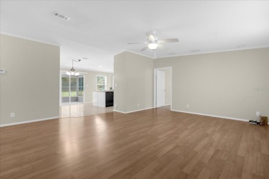 2024 NEW SHINGLE ROOF, gorgeous 3/2 modern split plan with on Zellwood Station Country Club in Florida - for sale on GolfHomes.com, golf home, golf lot