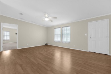 2024 NEW SHINGLE ROOF, gorgeous 3/2 modern split plan with on Zellwood Station Country Club in Florida - for sale on GolfHomes.com, golf home, golf lot