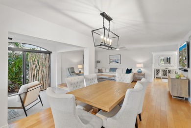 Enjoy serene lakefront views from this beautifully updated on Jonathans Landing Golf Club in Florida - for sale on GolfHomes.com, golf home, golf lot