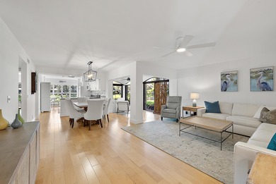 Enjoy serene lakefront views from this beautifully updated on Jonathans Landing Golf Club in Florida - for sale on GolfHomes.com, golf home, golf lot