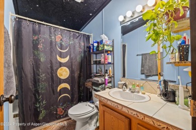 Your new 3 bed/ 2 bathroom home awaits in lovely Parachute CO on Battlement Mesa Golf Course in Colorado - for sale on GolfHomes.com, golf home, golf lot