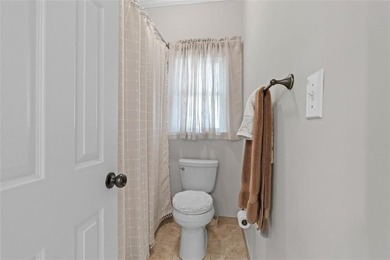 Welcome to 5619 Forkwood Dr- a beautiful and rare ranch home in on Brookstone Golf and Country Club in Georgia - for sale on GolfHomes.com, golf home, golf lot