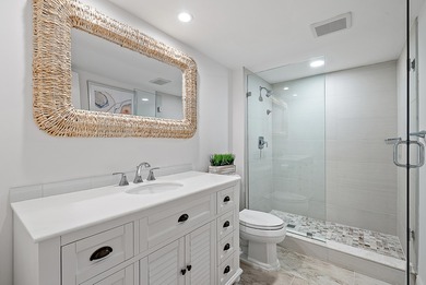 Enjoy serene lakefront views from this beautifully updated on Jonathans Landing Golf Club in Florida - for sale on GolfHomes.com, golf home, golf lot