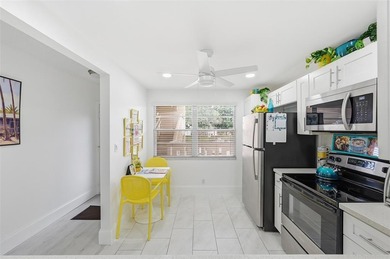 Beautifully updated second-floor condo featuring a tropical on Wynmoor Golf Course in Florida - for sale on GolfHomes.com, golf home, golf lot