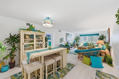 Beautifully updated second-floor condo featuring a tropical on Wynmoor Golf Course in Florida - for sale on GolfHomes.com, golf home, golf lot