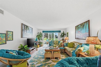 Beautifully updated second-floor condo featuring a tropical on Wynmoor Golf Course in Florida - for sale on GolfHomes.com, golf home, golf lot