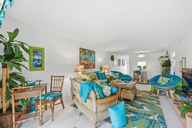 Beautifully updated second-floor condo featuring a tropical on Wynmoor Golf Course in Florida - for sale on GolfHomes.com, golf home, golf lot