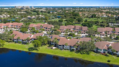 Enjoy serene lakefront views from this beautifully updated on Jonathans Landing Golf Club in Florida - for sale on GolfHomes.com, golf home, golf lot