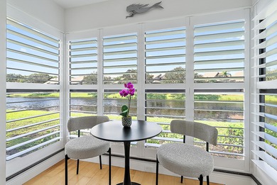 Enjoy serene lakefront views from this beautifully updated on Jonathans Landing Golf Club in Florida - for sale on GolfHomes.com, golf home, golf lot