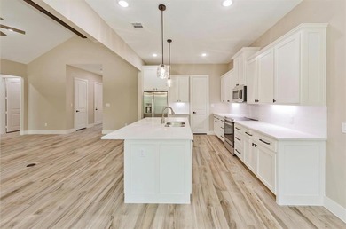 Welcome home to this Energy Star-certified residence in the on The Club At Runaway Bay in Texas - for sale on GolfHomes.com, golf home, golf lot