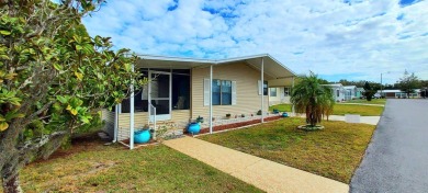 55+/1989/2 BD/2 BA/800 SQ FT/NEW FLOORING/LARGE SCREENED LANAI on Zephyrhills Municipal Golf Course in Florida - for sale on GolfHomes.com, golf home, golf lot